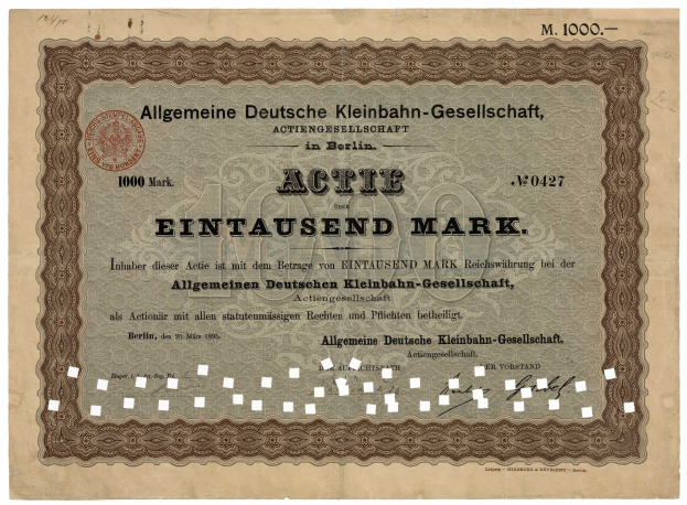 Ein altes deutsches Wertpapierzertifikat, das von der deutschen Regierung ausgegeben wurde und Text sowie einen Stempel enthält.