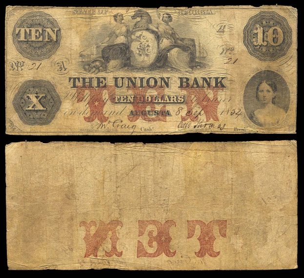 Alte Zehn-Dollar-Note der Union Bank aus dem Jahr 1862 mit einem Portraet einer Frau auf einem schwarzen Hintergrund.