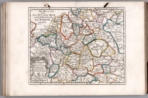 Offenes Buch mit einer detaillierten Deutschlandkarte; sichtbarer Text beschreibt wahrscheinlich die Karte.