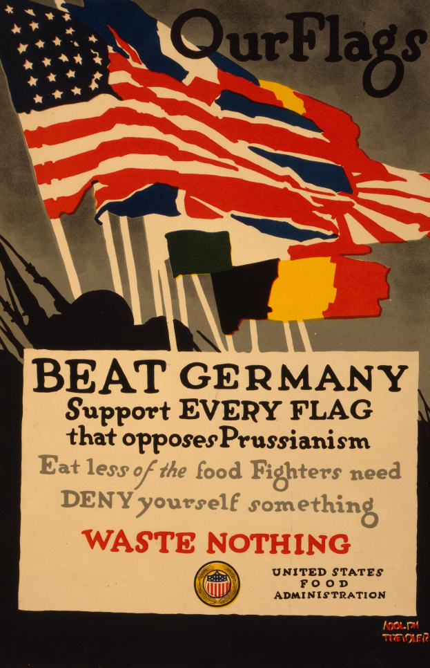 Ein Plakat mit einer roten, weißen und blauen Flagge mit einem weißen Stern und einer schwarzen, fetten Schrift, die lautet "Unsere Fahnen schlagen Deutschland - Unterstützt jede Fahne, die gegen Preußentum kämpft", umgeben von einem weißen Rand.